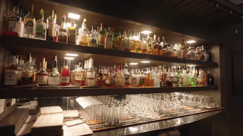 The bar at Giardino's with shelves of spirits