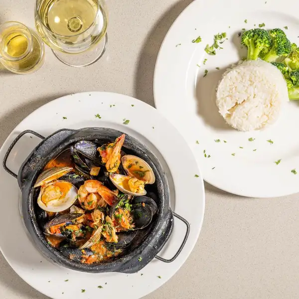 Seafood stew in a clay pot