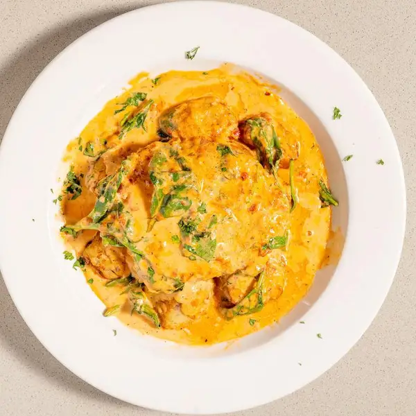 Lobster ravioli in pink sauce